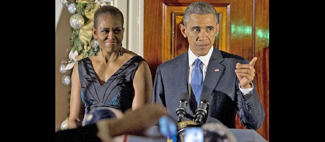  Barack Obama acompañado por su esposa hizo declaraciones en la Casa Blanca (NA)