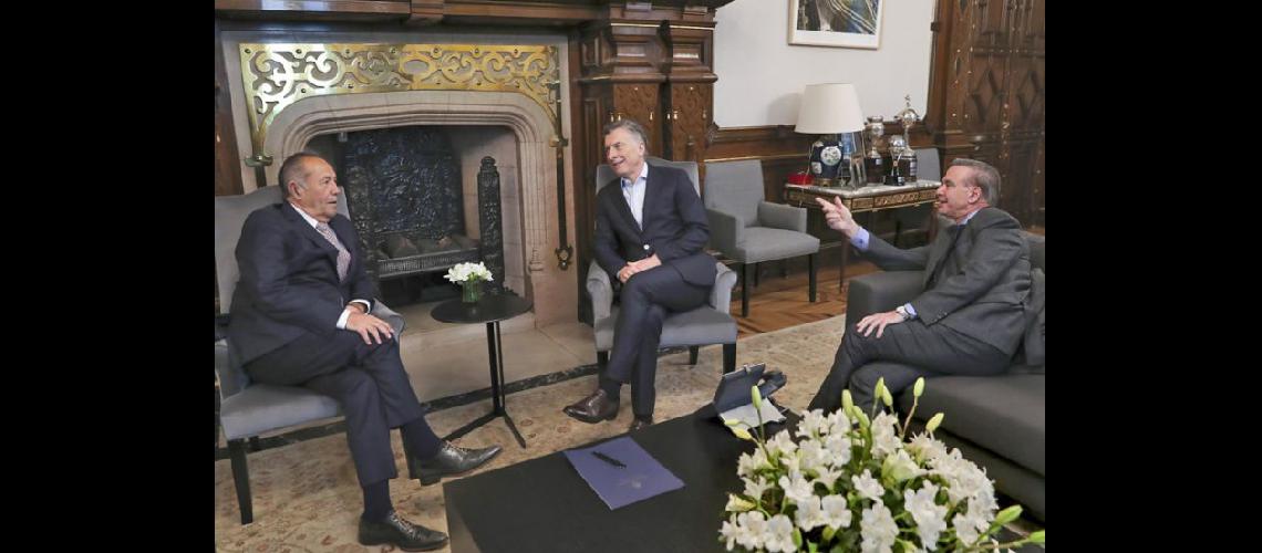  El presidente Macri y su compañero de fórmula Miguel Pichetto se reunieron con Adolfo Rodríguez Sa (NA)