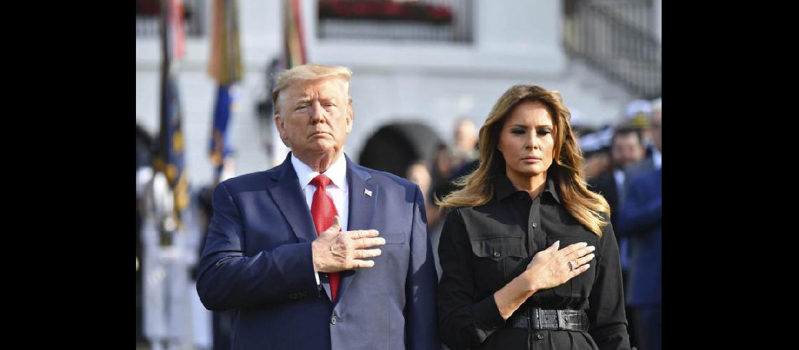  Donald Trump y su esposa Melania durante la conmemoración del 18º aniversario de los ataques (NA)