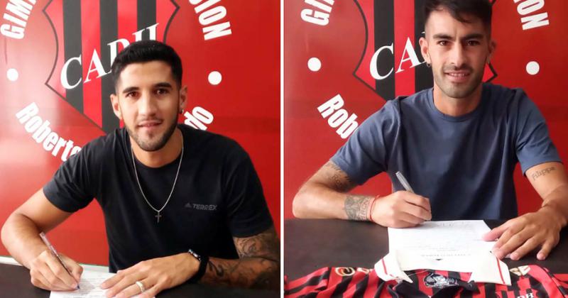 Lucas López y Santiago Gallucci Otero durante la firma de sus contratos con Douglas Haig