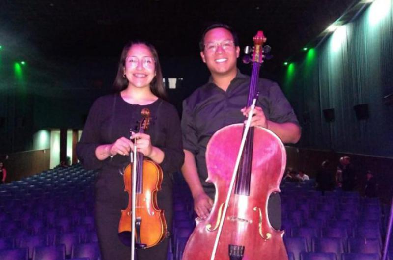 Aldana López y Claudio Martínez músicos que se iniciaron en la Orquesta Infanto Juvenil Municipal de barrio Kennedy